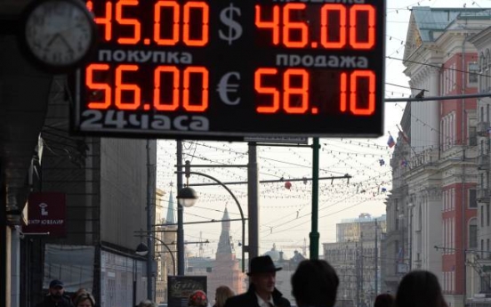 Amid currency gyrations, Russia floats ruble