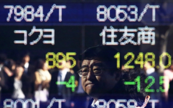 Tokyo investors cautious over market downturn