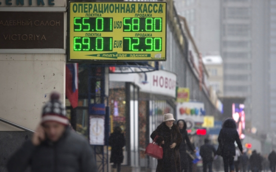 Russia raises key rate to protect ailing economy