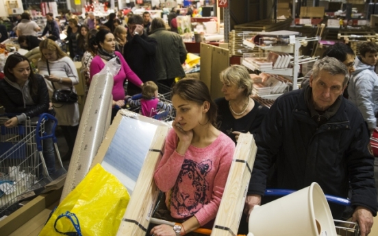 Russians flock to stores to pre-empt price rises