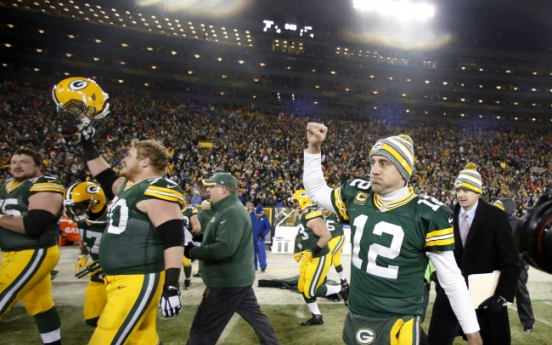 Rodgers, Packers claim NFC North