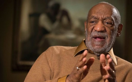 Bill Cosby jokes about rape allegations