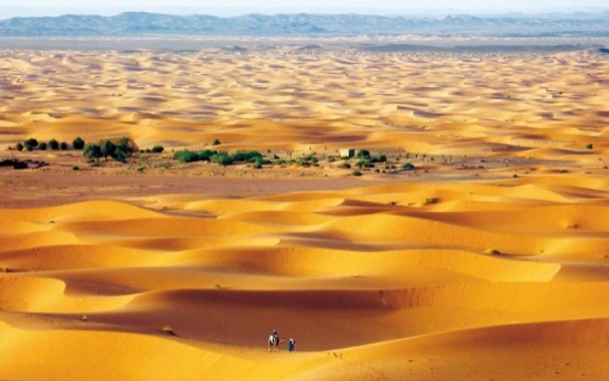 Sand dunes, camels and clay castles in Moroccan desert