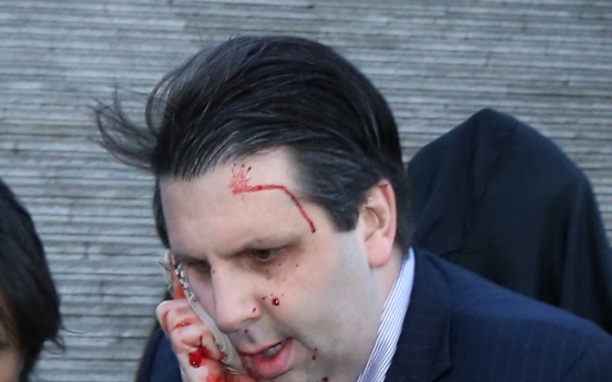 U.S. envoy hurt in knife attack