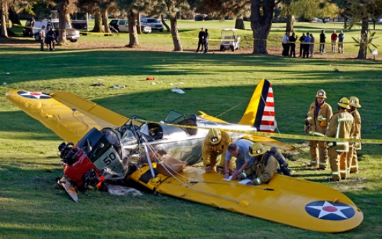 Harrison Ford survives crash-landing on golf course