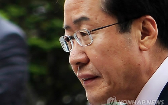 Governor denies bribery charges in Sung scandal