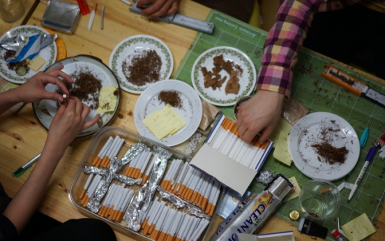 Cigarette making becomes art project