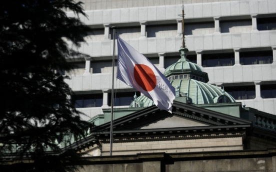 BOJ tweaks stimulus to encourage corporate spending, hiring