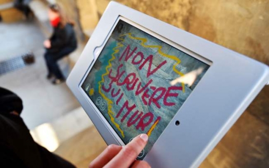 Itching to graffiti? Do it digitally on Florence treasures