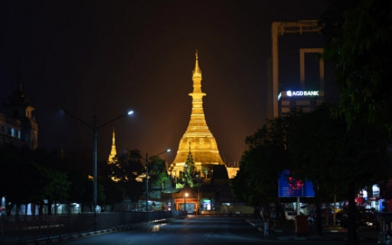 Myanmar pagoda re-clad with gold blocks as devotees look to gain spiritual credit