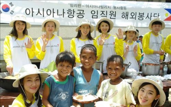 [Photo News] Asiana Airlines volunteers in the Philippines