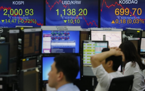 Seoul shares end lower after BOJ's surprise move