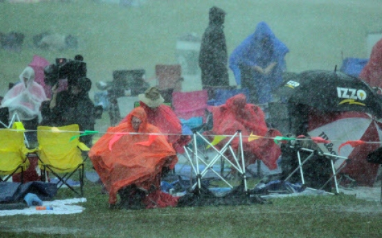 Jazz fest’s last day finishes soggy, but strong