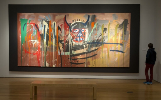 Basquiat sets artist record at Christie’s sale at $57.3 million