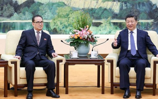 Leaders of N. Korea, China voice hope to mend ties