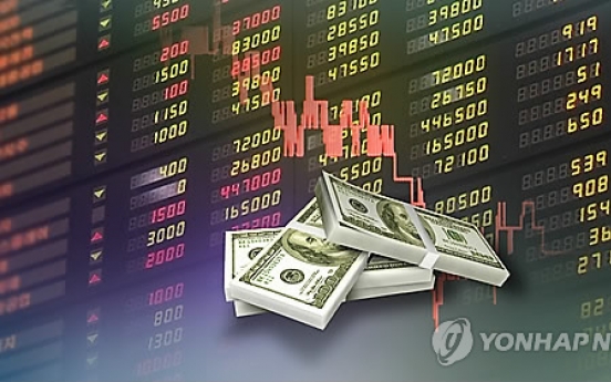 Korean shares down in late morning trade