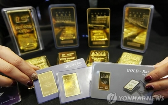 Gold reaches record high in morning trading