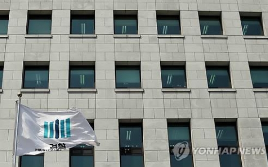 Senior prosecutor summoned over suspicious stock dealings