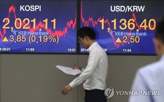 Korean shares down in late morning trading