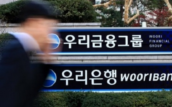 Woori Bank Q2 net jumps 36% on less loan-loss reserves