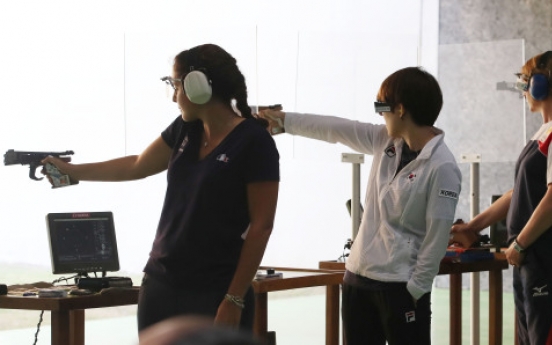 Reigning gold medalist fails to reach pistol shooting final