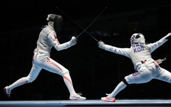 Former Olympic medalist takes early exit in foil fencing