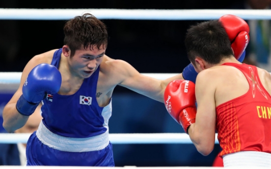 Lone Korean boxer loses in competition's 2nd round