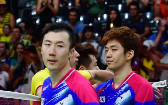 Top-ranked men's badminton duo shocked in quarters