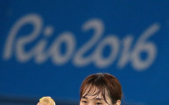 Korean Kim So-hui wins taekwondo gold