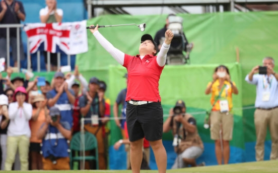 Golfer defies odds for gold