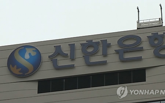 Shinhan Financial, Woori profits rise on lending growth