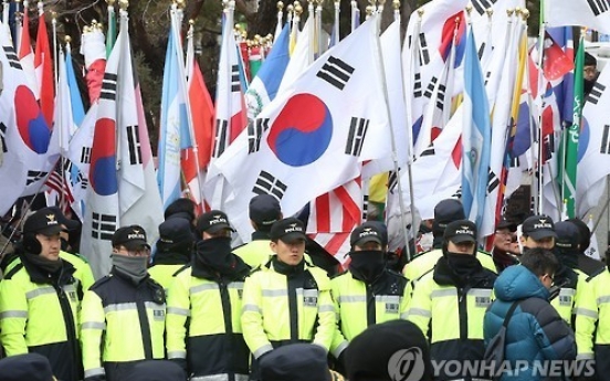 Park's supporters rally outside court as impeachment ruling nears