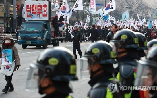 16 under police probe for violent rallies after Park's ouster