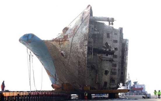 Sewol ferry moved on land, search for missing victims begins