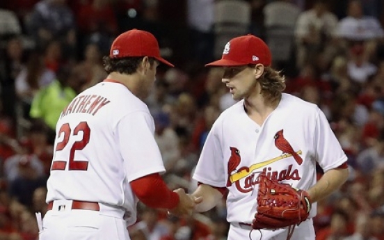 Fowler, Leake lead Cardinals past Marte-less Pirates 2-1