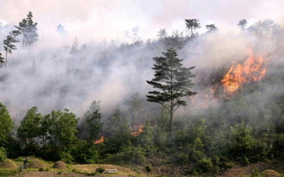 [Newsmaker] Hiker killed as wildfires ravage eastern areas