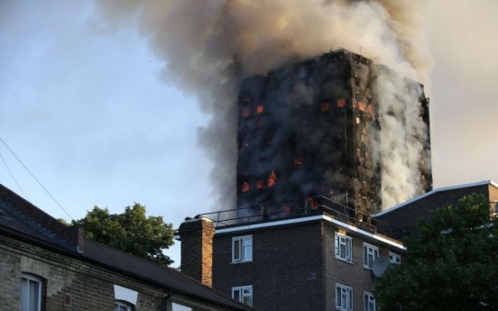 Death toll rises to 12 in London apartment building inferno