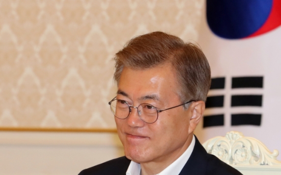 Record high popularity boosts Moon, feeds ire of opposition