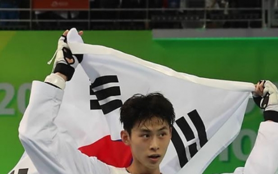 Kim Tae-hun wins 3rd straight gold at taekwondo worlds