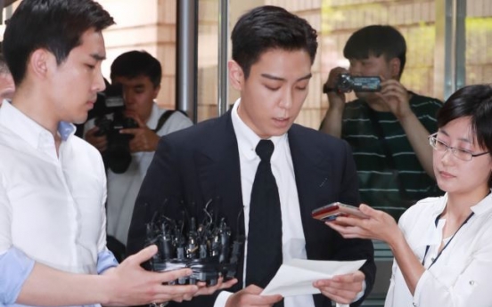 T.O.P attends first hearing for marijuana charges, apologizes to mother