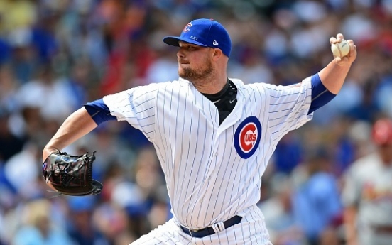 Lester hits first homer, throws 2,000th K in Cubs’ blowout win