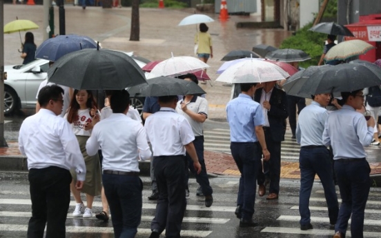 South Koreans work second-longest hours in OECD for below average pay