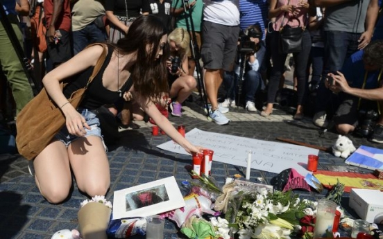 Tourists and Barcelona residents return to Las Ramblas