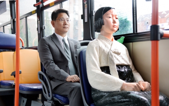 [Herald Interview] How comfort women statues got to ride Seoul buses