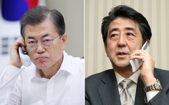 Moon, Abe agree to peaceful solution to North Korea’s provocations