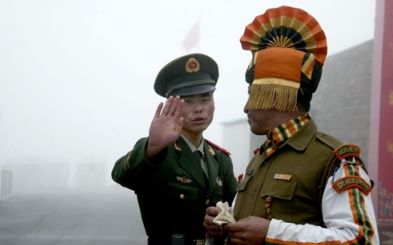 India, China to pull back troops from border confrontation
