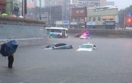 Torrential rain hits Busan, southern cities