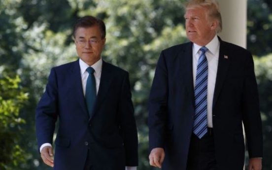 Moon greets Trump at US base