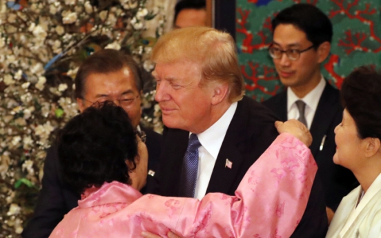 Trump’s hug with comfort woman draws ire from Japan