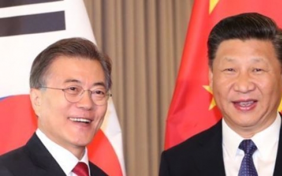 Moon, Xi to hold bilateral summit, normalize ties soured by THAAD